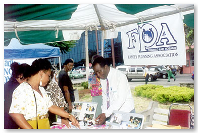 Family Life Educator conducts a demonstration at an FPATT exhibition