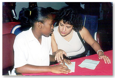 A facilitator and a young participant discuss important issues impacting on adolescent sexuality and reproductive health.